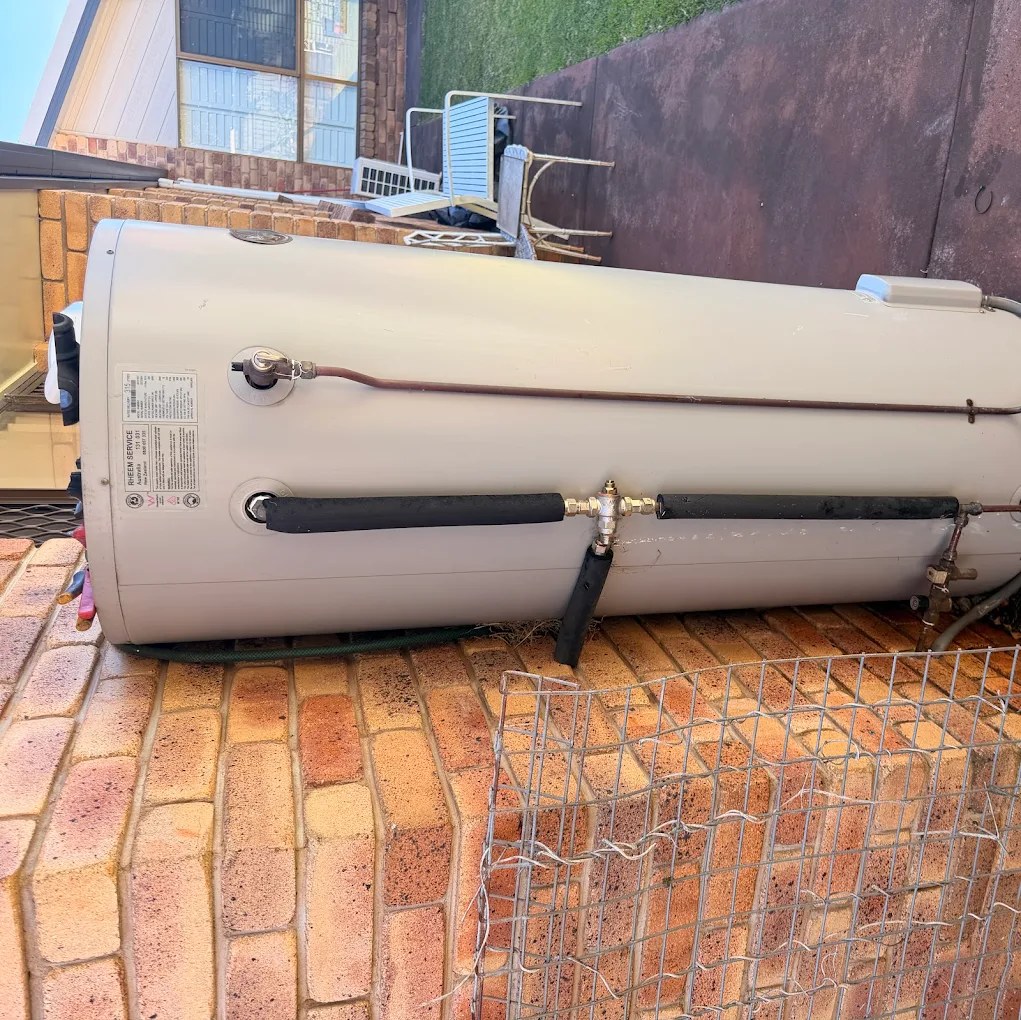 New Rheem hot water unit plumbed in with tempering valve